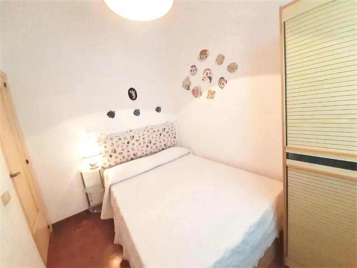 Cosy Holiday Home In Marinella With Shared Pool